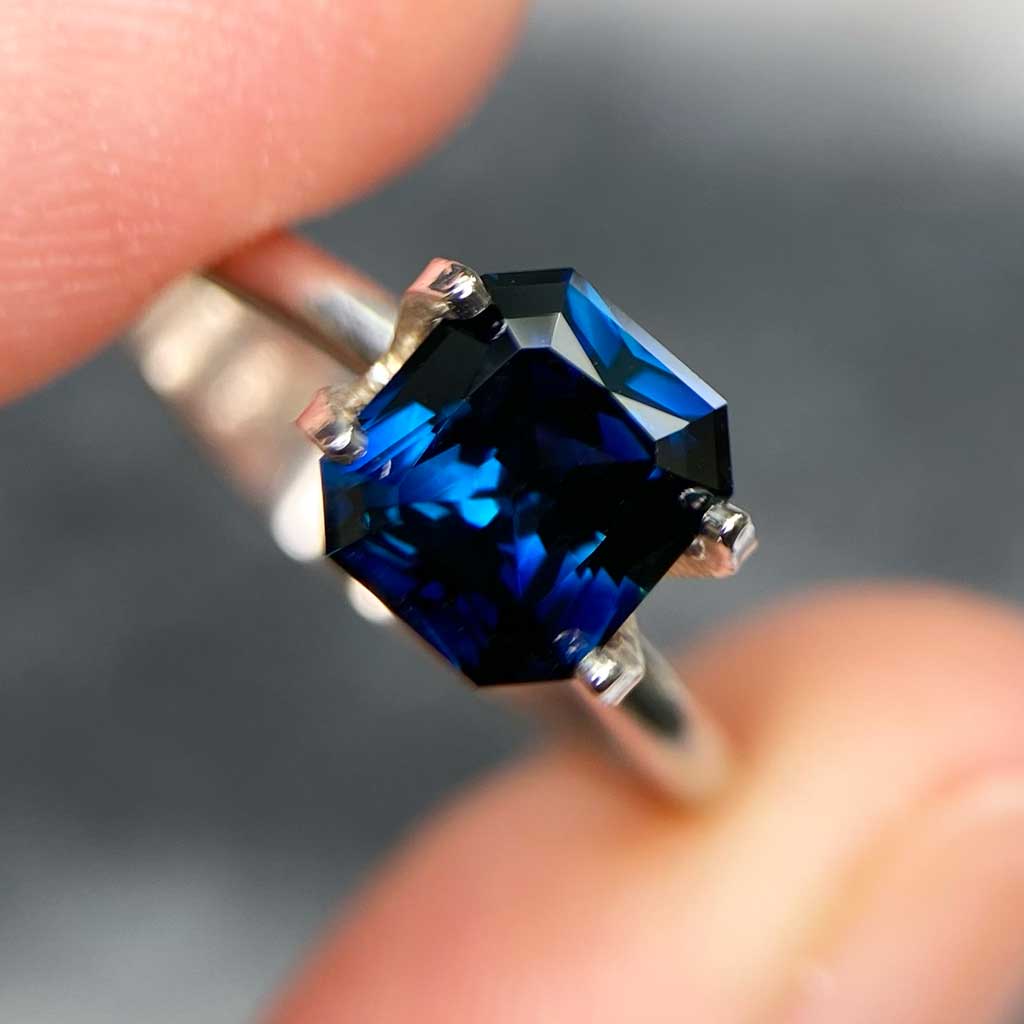 Emerald radiant cut Australian teal sapphire bespoke engagement ring Sydney jeweller Lizunova Fine Jewels Australia