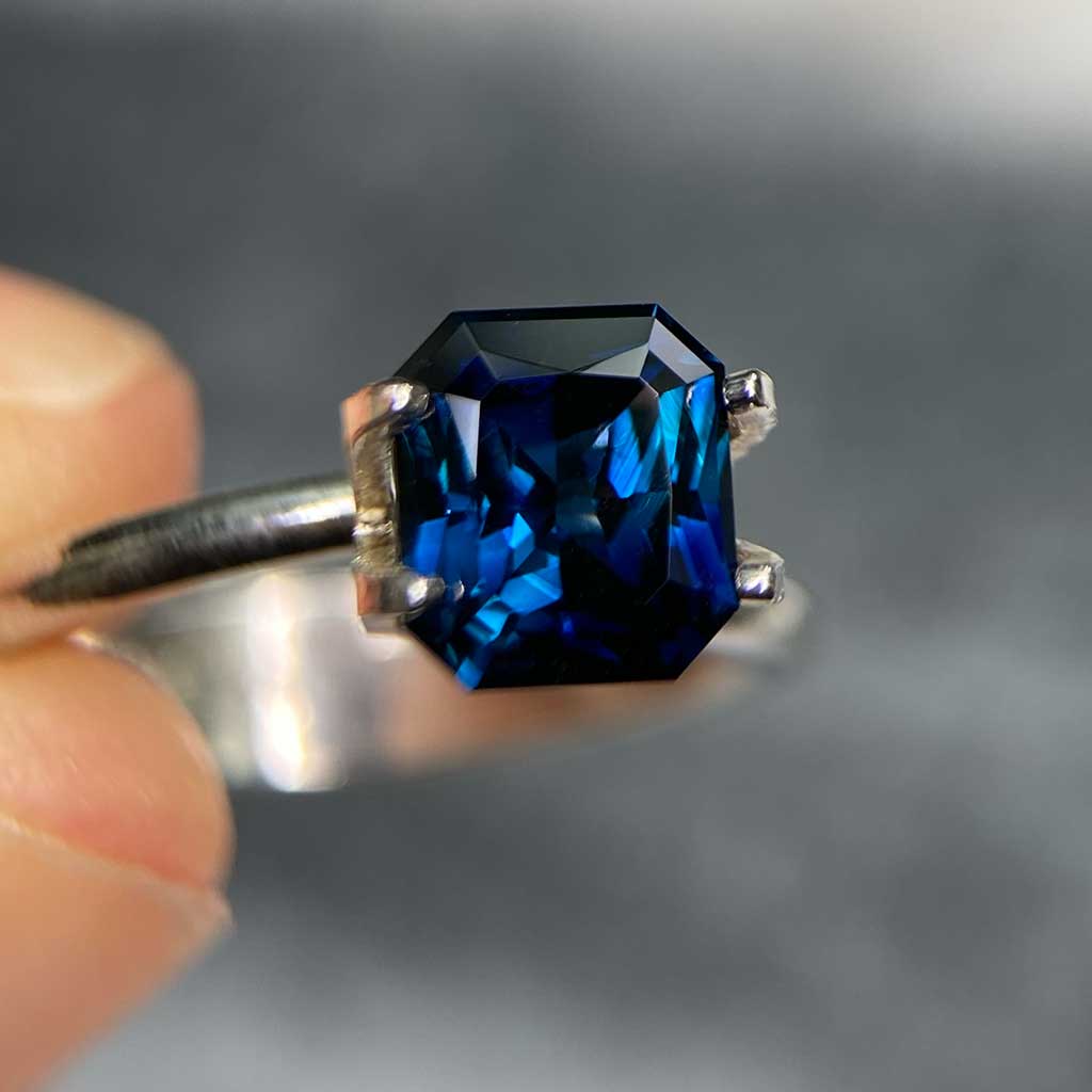 Emerald radiant cut Australian teal sapphire bespoke engagement ring Sydney jeweller Lizunova Fine Jewels Australia