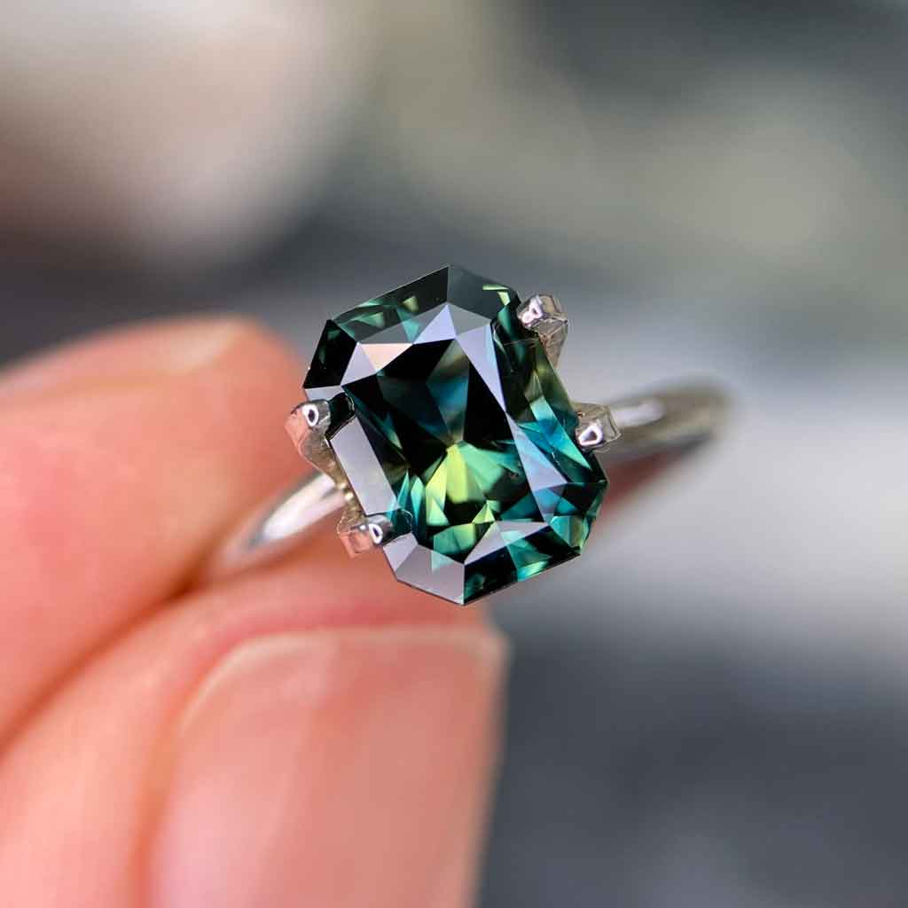 2.51ct emerald radiant cut Australian teal parti sapphire available to set in a bespoke sapphire engagement ring by Sydney jeweller Lizunova NSW Australia
