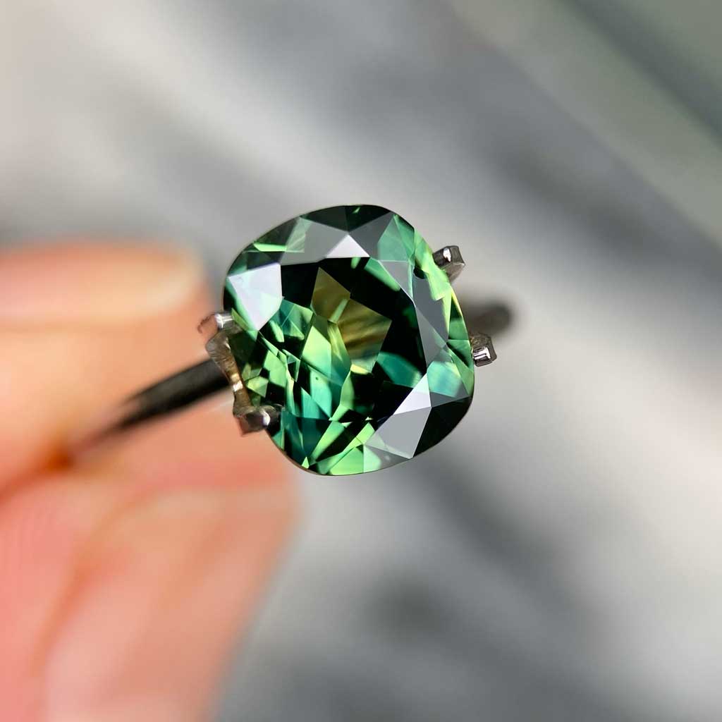 2.71ct cushion cut Australian parti sapphire available for a bespoke engagement ring by Lizunova Fine Jewels