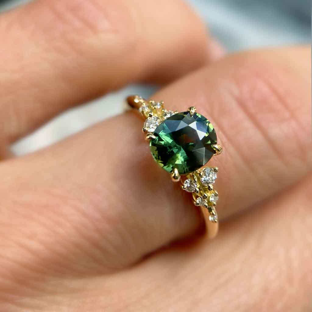 Asymmetric sapphire and diamond engagement ring by Sydney jeweller Lizunova