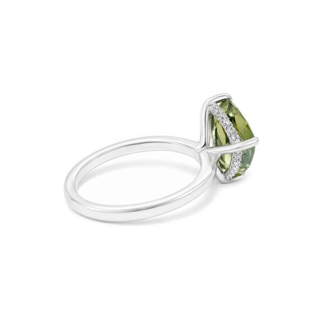Freeform asymmetric Australian parti sapphire engagement ring with a hidden diamond halo by Lizunova Fine Jewels