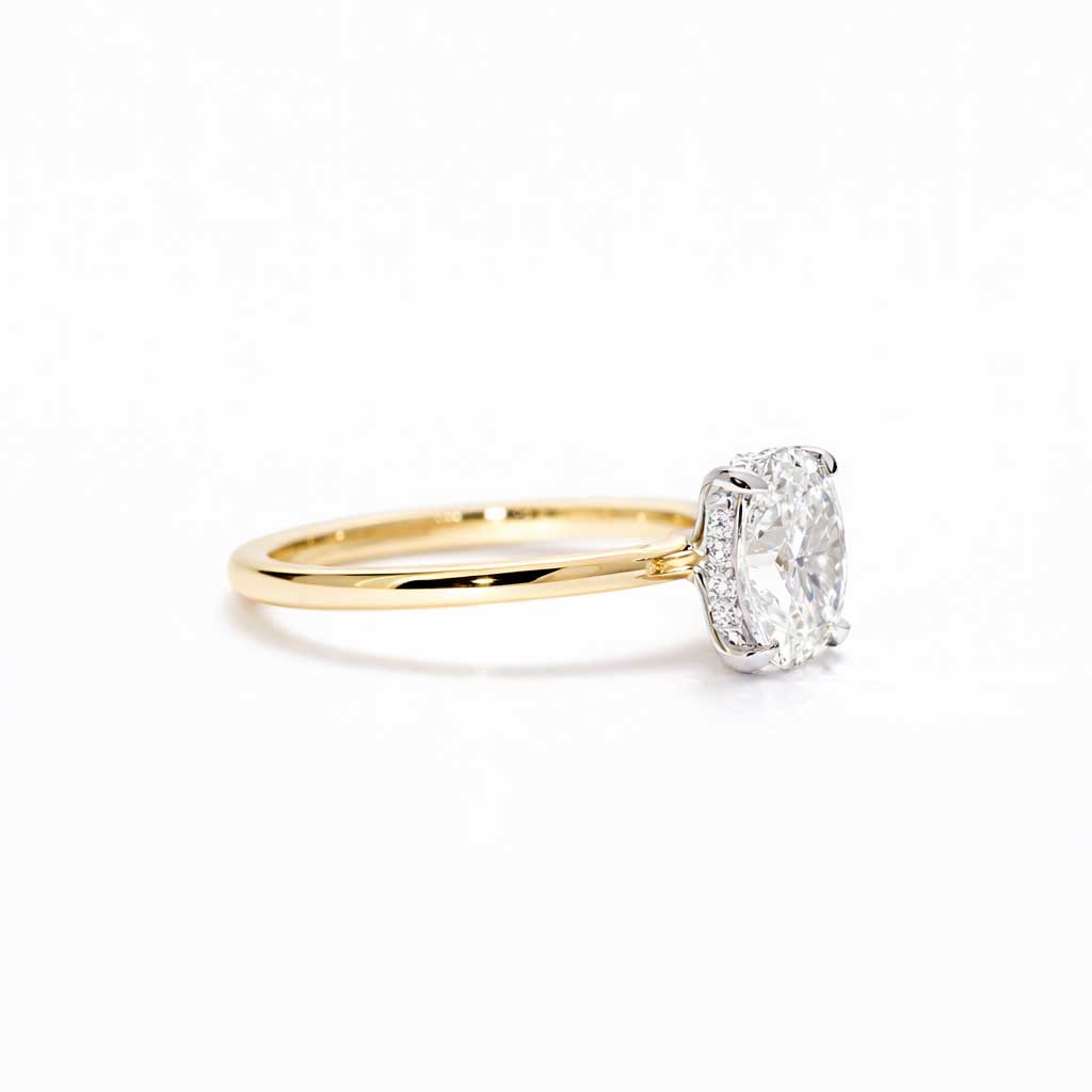Billie | Oval diamond engagement ring with a hidden halo