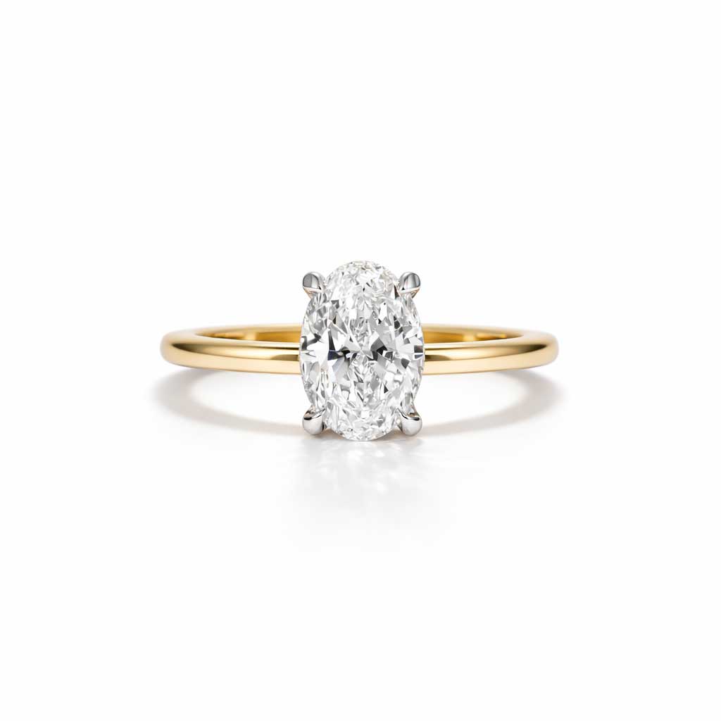 Billie | Oval diamond engagement ring with a hidden halo