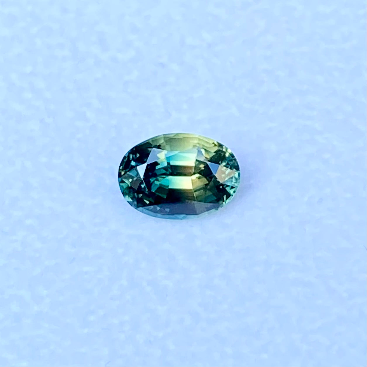 Australian-parti-teal-sapphire-bespoke-engagement-ring-Sydney-jeweller-Lizunova-Fine-Jewels