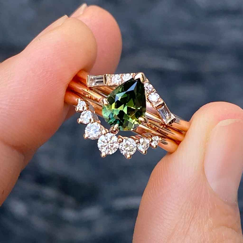 Australian parti teal sapphire bespoke engagement rings Sydney jeweller Lizunova Fine Jewels Sydney Australia