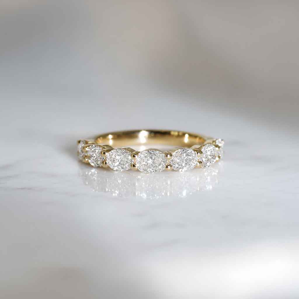 Phoebe | Oval diamond east-west wedding ring