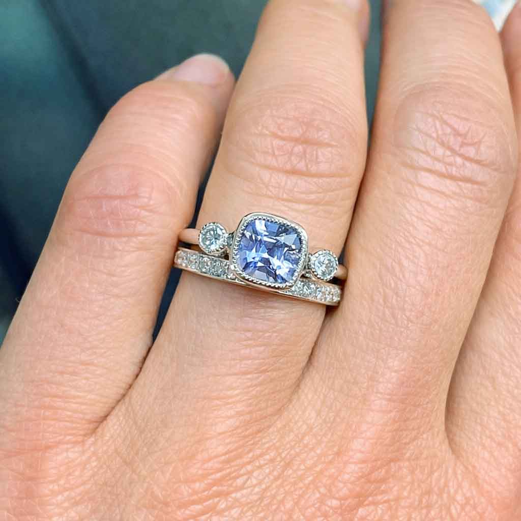 Cushion cut grey spinel diamond trilogy engagement ring in 18k white gold with milgrain detail, handcrafted in Sydney by jeweller Lizunova