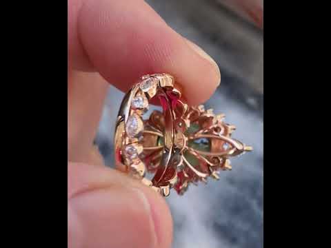 Marquise and round diamond wedding band in 18k rose gold, and Chloe, an Australian sapphire engagement ring, handcrafted in Sydney by Lizunova