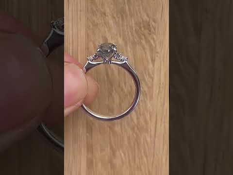 Salt and pepper diamond cluster engagement ring with black diamonds and white diamond accents, crafted in white gold by Sydney jeweller Lizunova