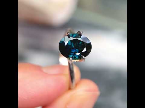 Oval Australian teal sapphire available to set in a bespoke engagement ring by Sydney jeweller Lizunova, Australia