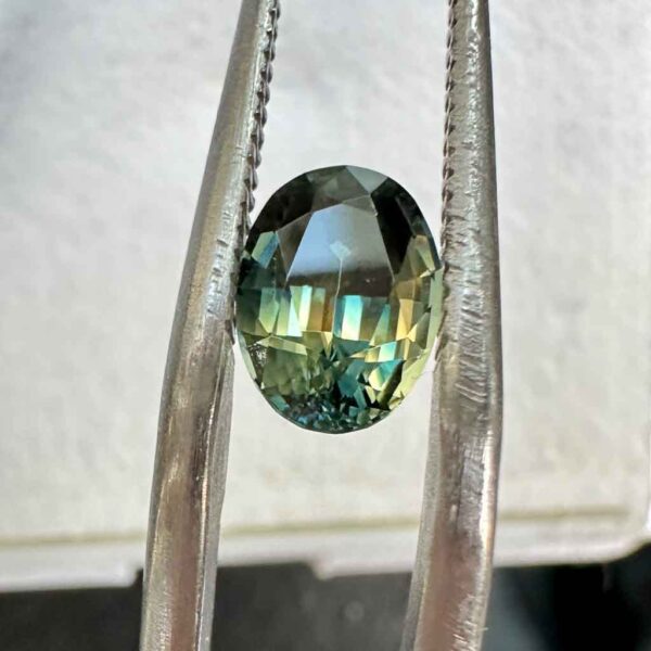 Australian-oval-teal-sapphire-bespoke-jewellery-ring-Sydney-jeweller-Lizunova-Fine-Jewels-SKU00113