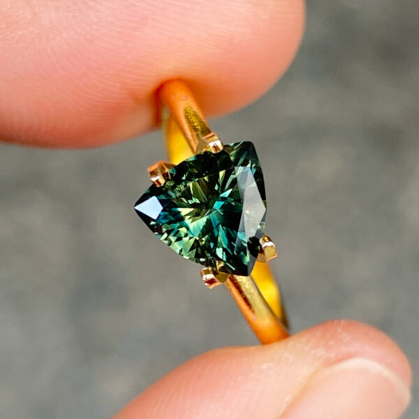 Australian-trilliant-parti-teal-sapphire-bespoke-engagement-ring-Sydney-jeweller-Lizunova-Fine-Jewels
