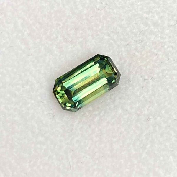 Australian-emerald-cut-teal-sapphire-bespoke-engagement-ring-Sydney-jeweller-Lizunova-Fine-Jewels jeweller Lizunova Fine Jewels