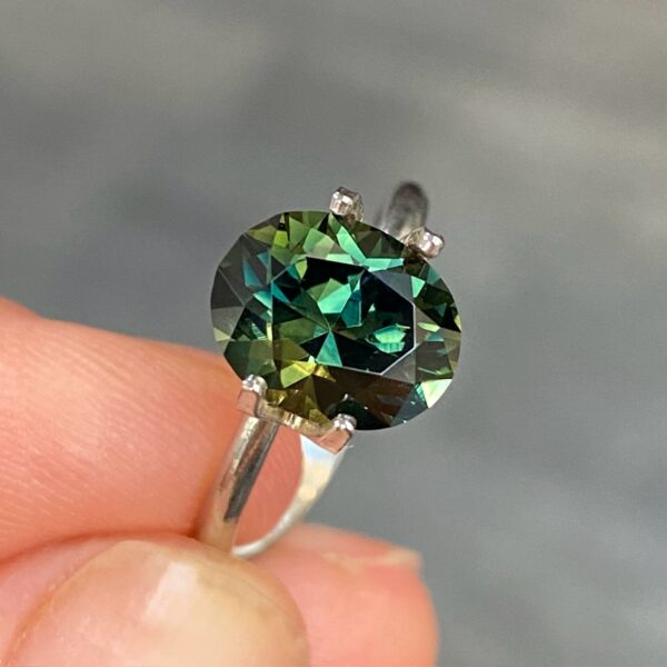 Australian-oval-teal-green-sapphire-bespoke-engagement-ring-Sydney-jeweller-Lizunova-Fine-Jewels jeweller Lizunova Fine Jewels