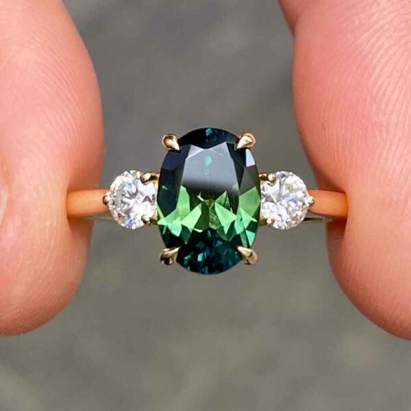 Oval-Australian-parti-teal-sapphire-diamond-engagement-ring-three-stone-ring-Sydney-jeweller-Lizunova-Fine-Jewels
