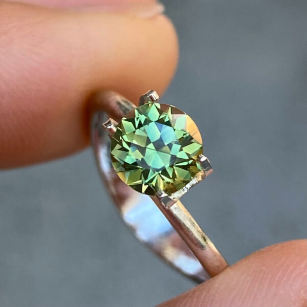 Australian-light-green-teal-sapphire-bespoke-engagement-ring-Sydney-jeweller-Lizunova-Fine-Jewels