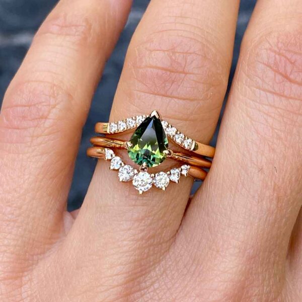 Australian parti teal sapphire bespoke engagement rings Sydney jeweller Lizunova Fine Jewels Sydney Australia
