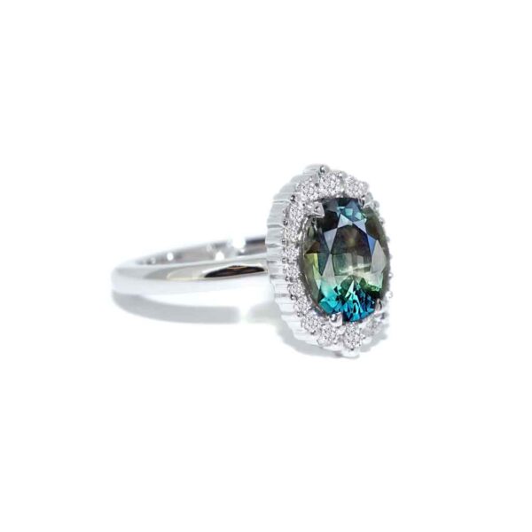 Australian-teal-parti-sapphire-diamond-halo-engagement-ring-Sydney-jeweller-Lizunova-Fine-Jewels
