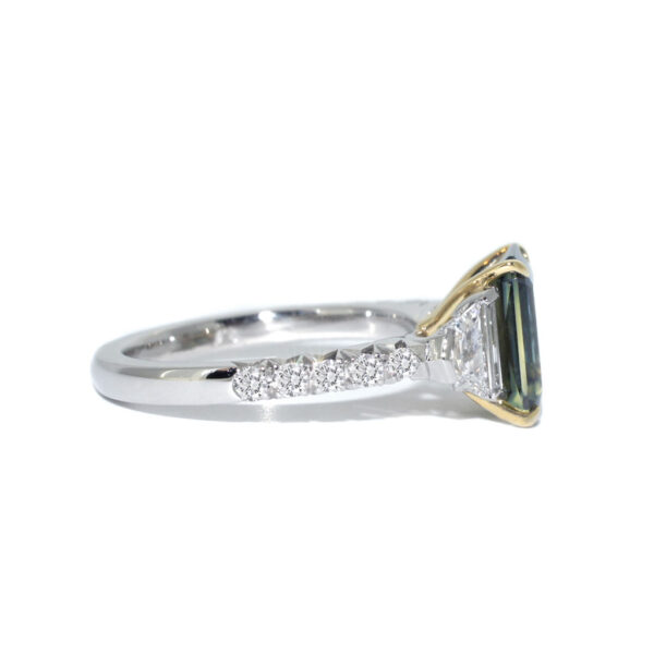 Australian parti teal emerald cut sapphire bespoke engagement ring Sydney jeweller Lizunova Fine Jewels Sydney Australia