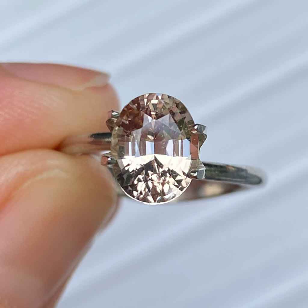 oval-apricot-sapphire-engagement-ring-Lizunova-Fine-Jewels-Sydney-Jeweller-Sydney-NSW-Australia