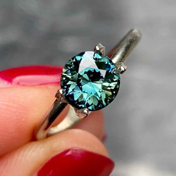 round-unheated-teal-sapphire-custom-engagement-ring-Sydney-jeweller-Lizunova-Fine-Jewels