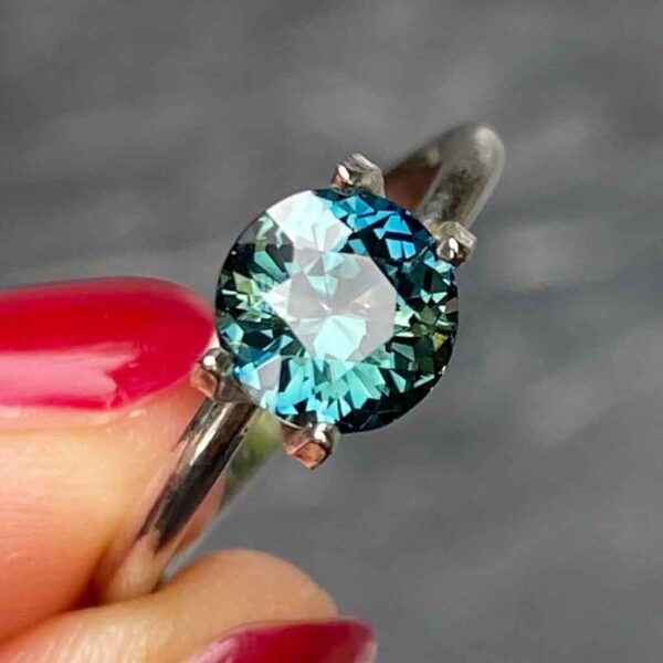 round-unheated-teal-sapphire-custom-engagement-ring-Sydney-jeweller-Lizunova-Fine-Jewels