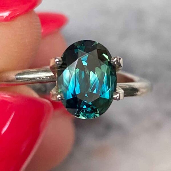 oval-Australian-teal-parti-sapphire-engagement-ring-sydney-jeweller-lizunova-australia