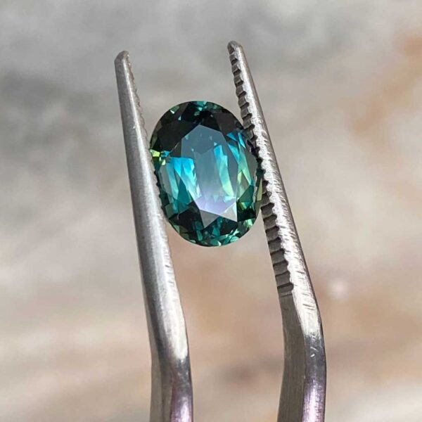 oval-Australian-teal-parti-sapphire-engagement-ring-sydney-jeweller-lizunova-australia