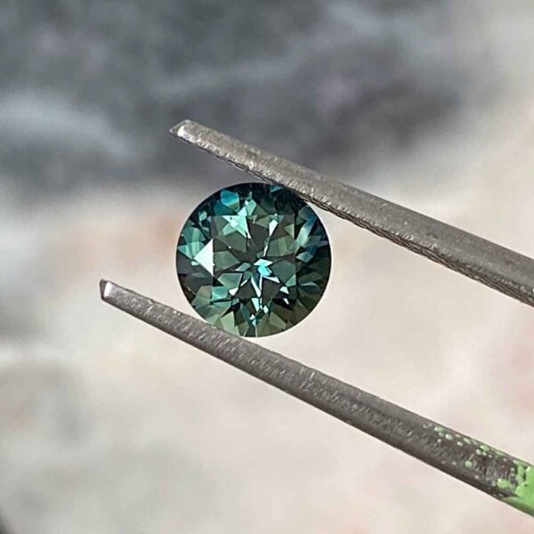 round-australian-teal-sapphire-custom-engagement-ring-Sydney-jeweller-Lizunova-Fine-Jewels