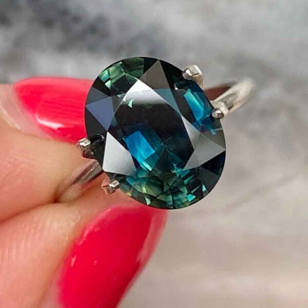 oval-australian-teal-parti-sapphire-custom-engagement-ring-Sydney-jeweller-Lizunova-Fine-Jewels