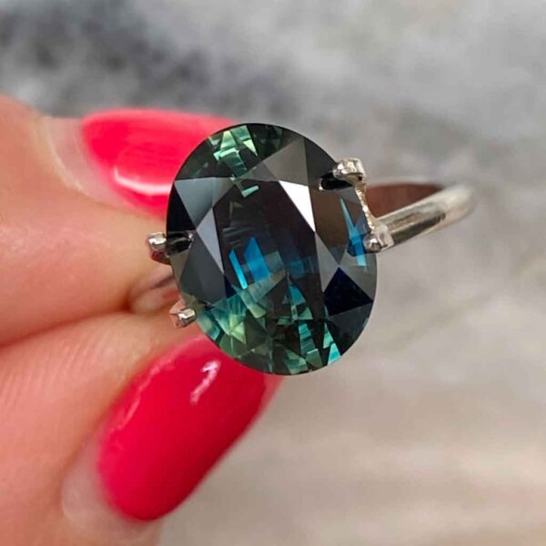 oval-australian-teal-parti-sapphire-custom-engagement-ring-Sydney-jeweller-Lizunova-Fine-Jewels