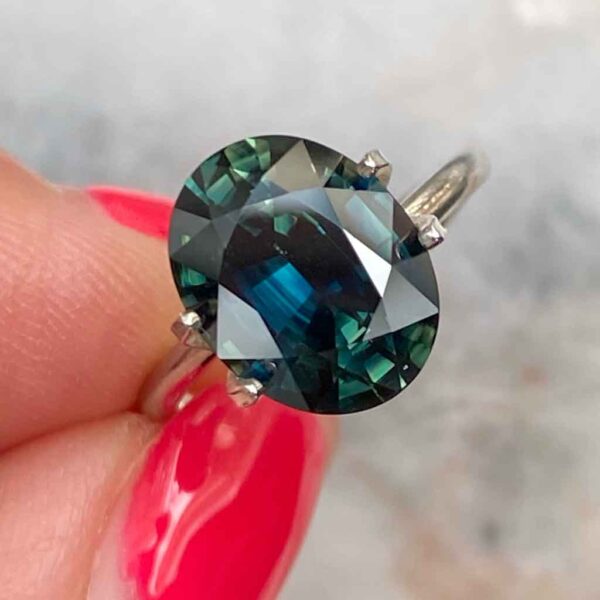 oval-australian-teal-parti-sapphire-custom-engagement-ring-Sydney-jeweller-Lizunova-Fine-Jewels