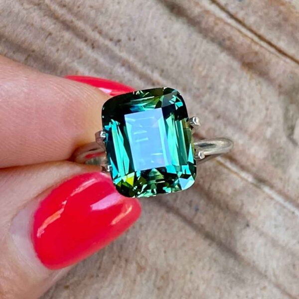 cushion-cut-teal-sapphire-custom-engagement-ring-Sydney-jeweller-Lizunova-Fine-Jewels