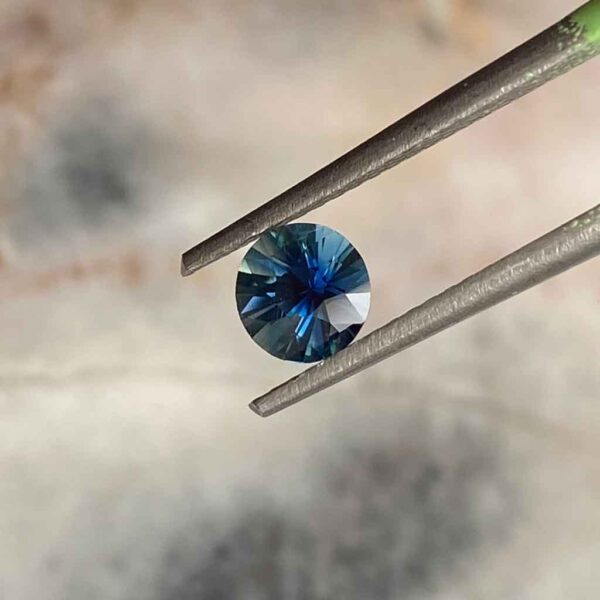 round-teal-Madagascan-sapphire-custom-engagement-ring-Sydney-jeweller-Lizunova-Fine-Jewels